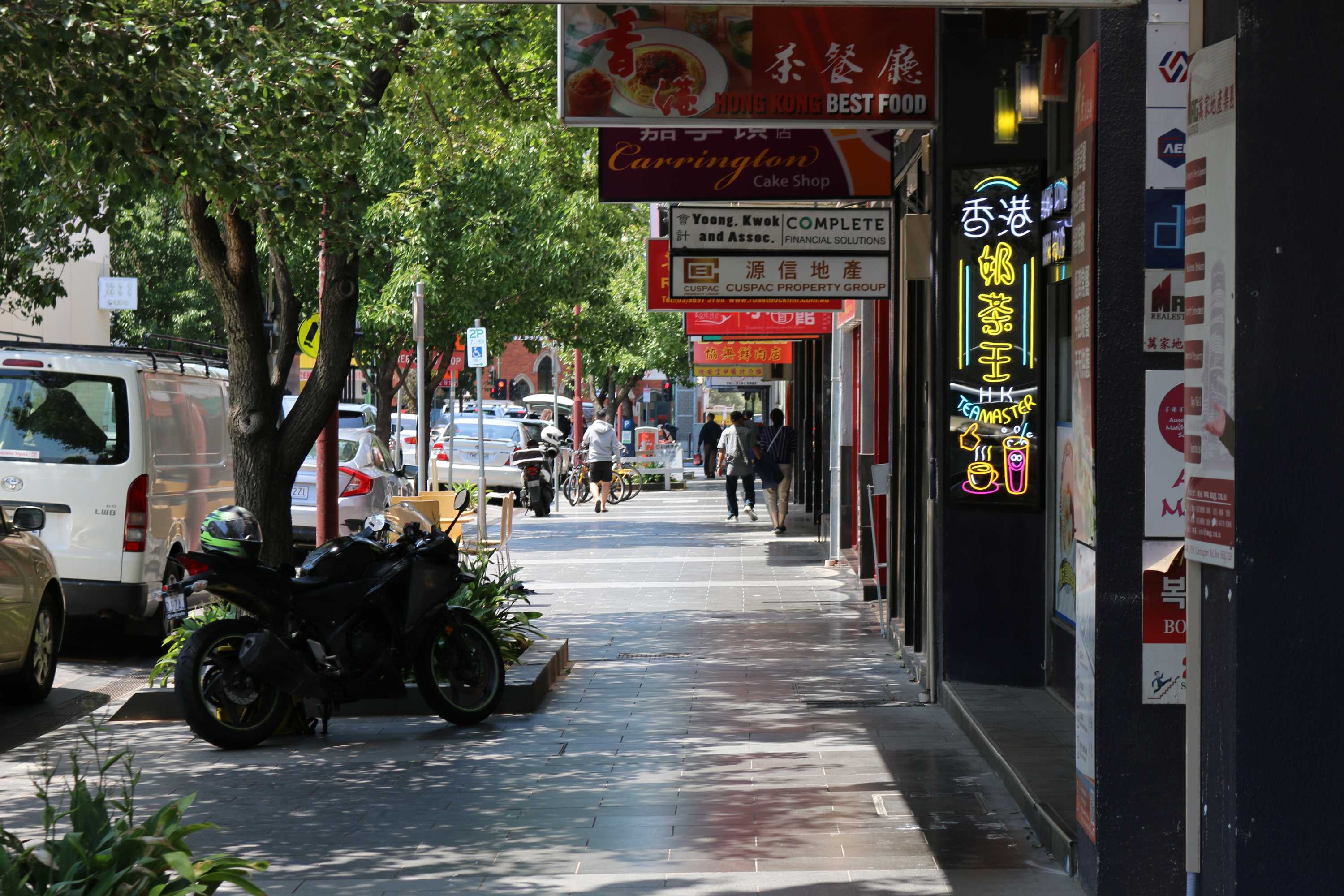 A street with many Chinese restaurants.